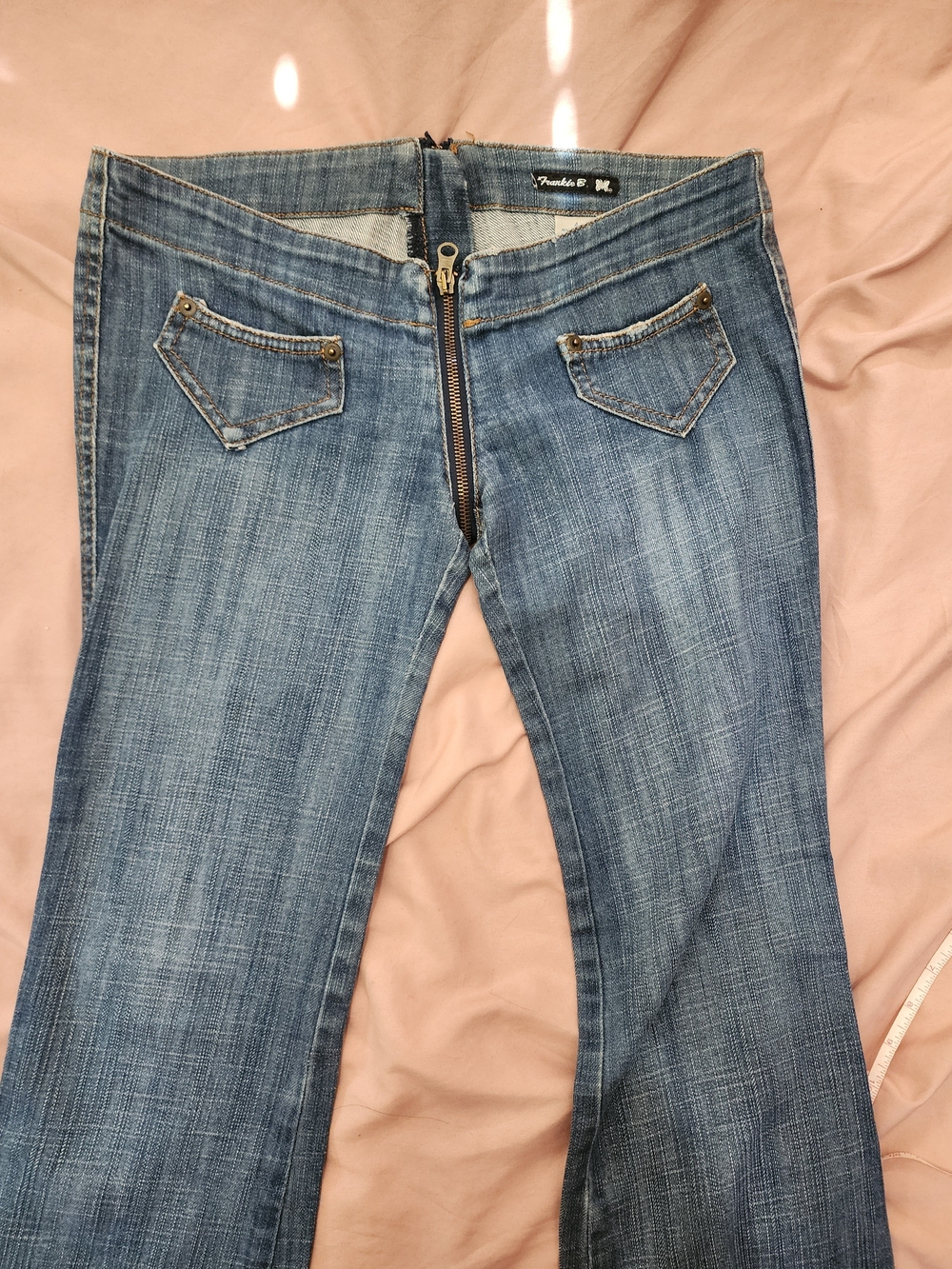 Frankie B. Low Rise Split Medium Wash Flare Jeans with Full Front To Back Zipper